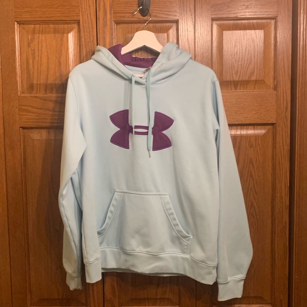 Under Armour brand hooded pull over sweatshirt in women’s Large size
